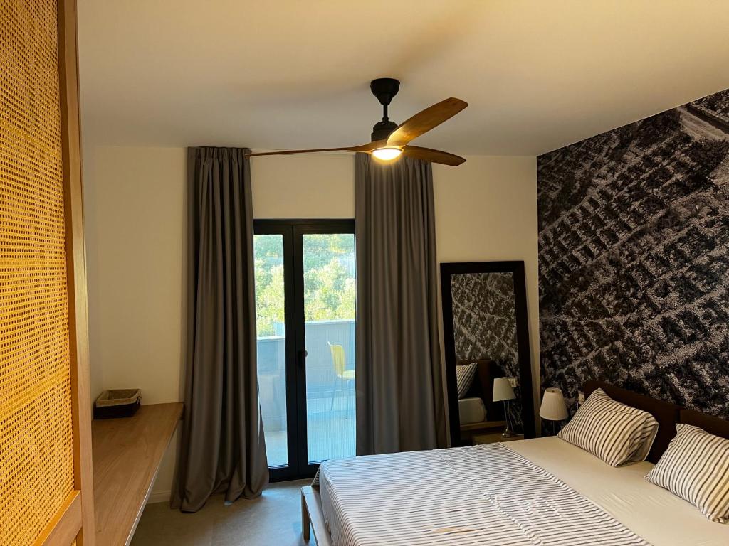 Postel nebo postele na pokoji v ubytování Miliša residence