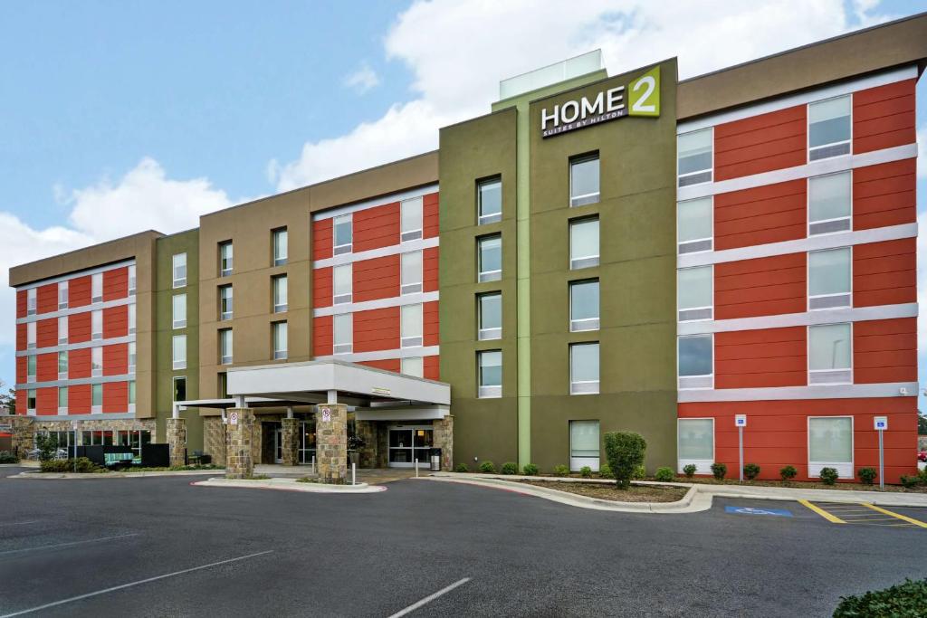 a rendering of a hotel with a parking lot at Home2 Suites by Hilton Little Rock West in Little Rock