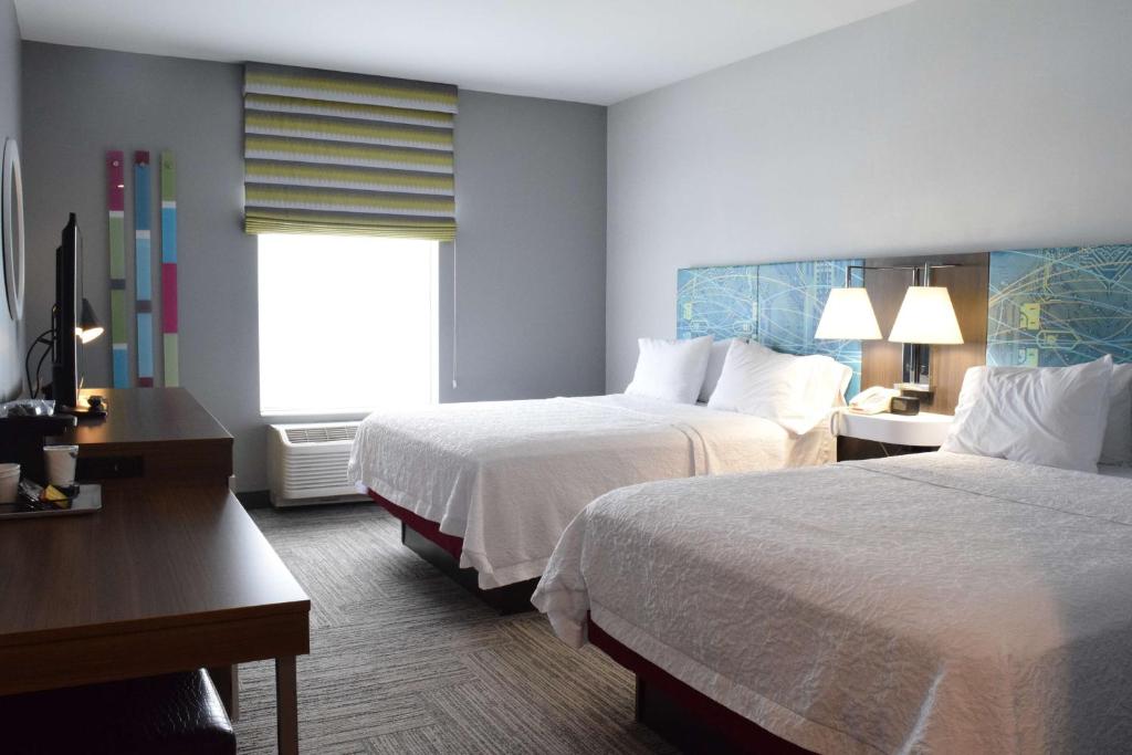 Postel nebo postele na pokoji v ubytování Hampton Inn Hamburg
