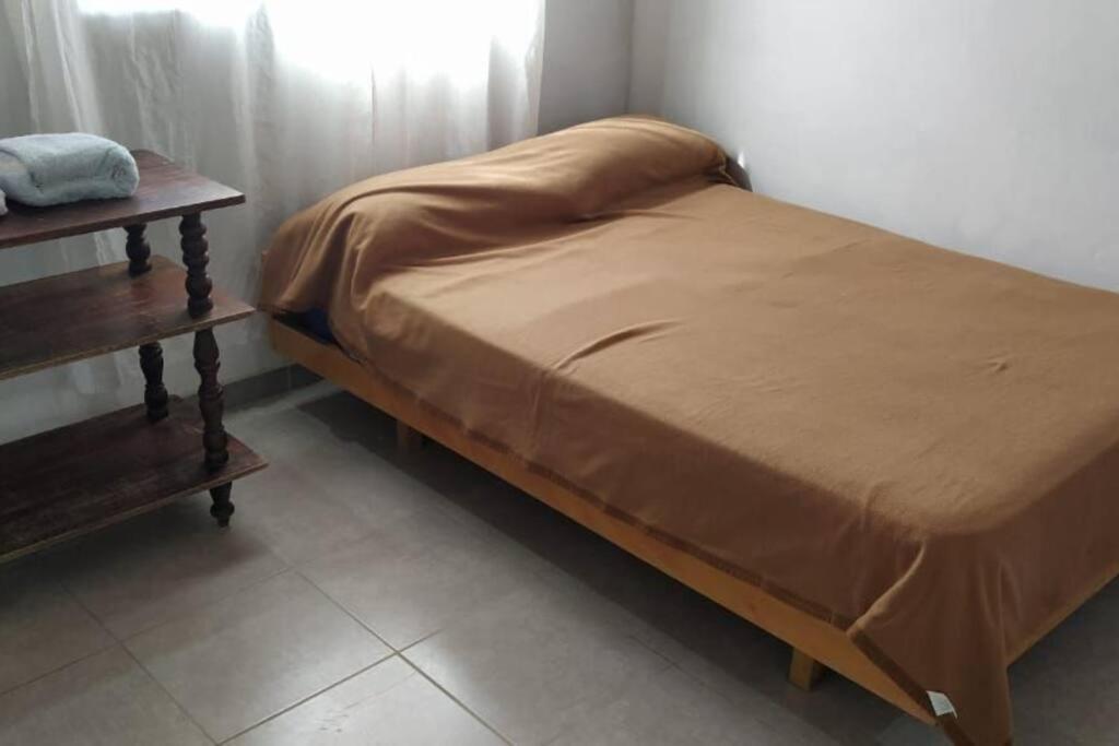 Ένα ή περισσότερα κρεβάτια σε δωμάτιο στο Casa Cafa