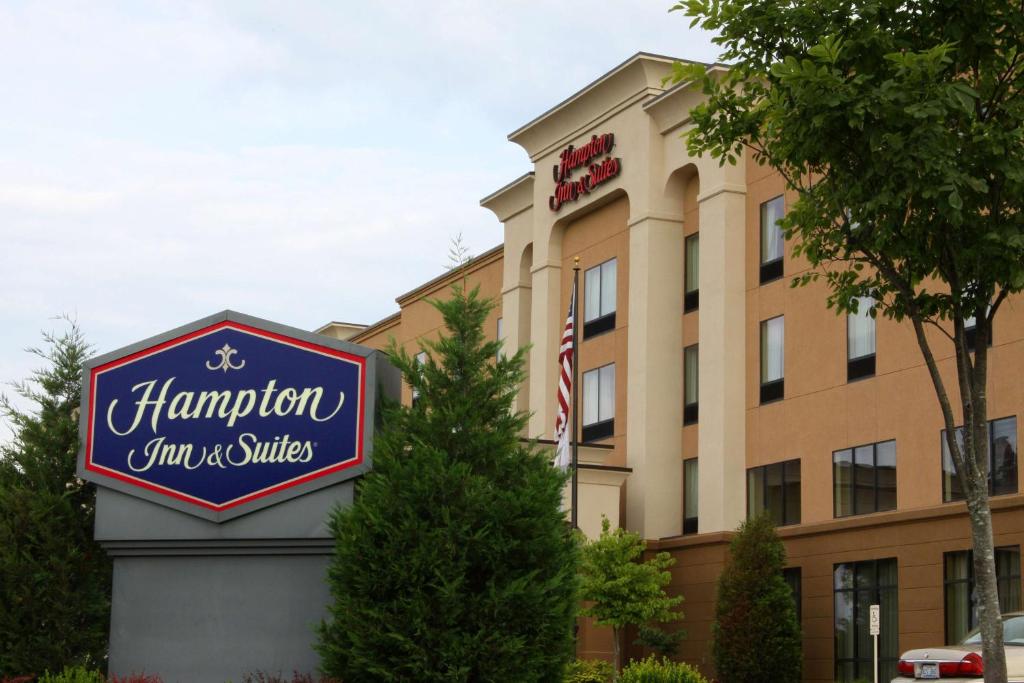 a sign for a hampton inn and suites at Hampton Inn & Suites Paducah in Paducah