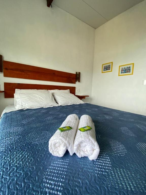 Postel nebo postele na pokoji v ubytování Casa Caiçara