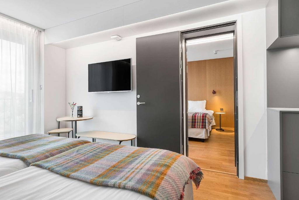 Postel nebo postele na pokoji v ubytování Best Western Plus Ten Hotel