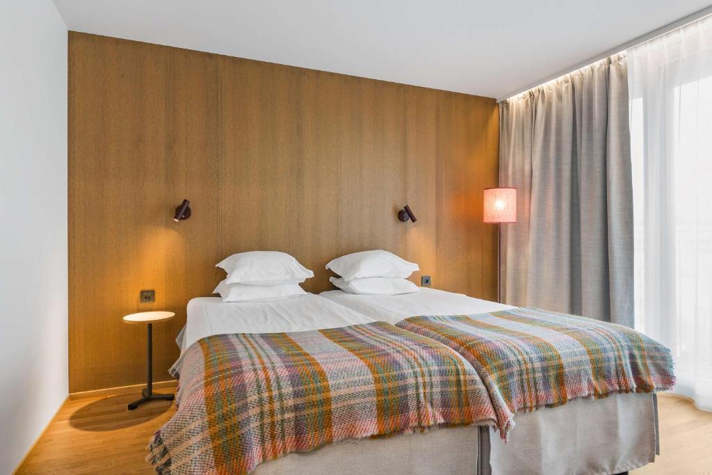 Postel nebo postele na pokoji v ubytování Best Western Plus Ten Hotel