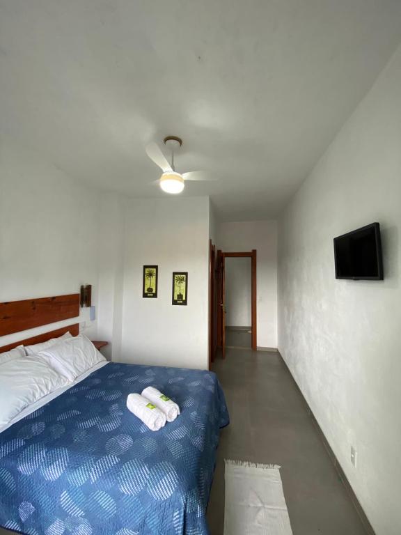 Postel nebo postele na pokoji v ubytování Casa Caiçara