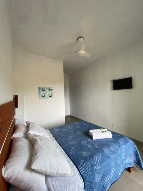 Postel nebo postele na pokoji v ubytování Casa Caiçara