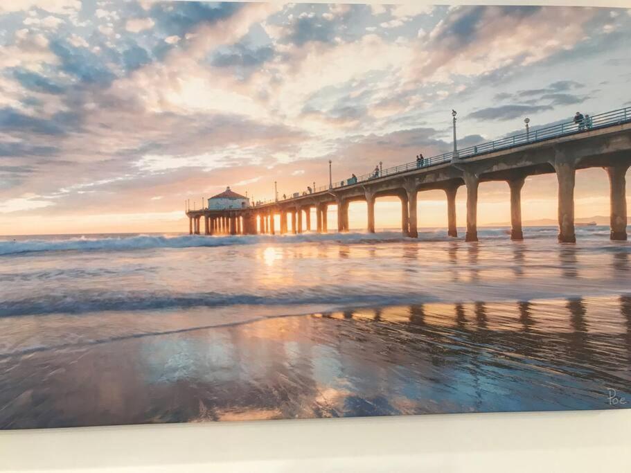 a painting of a pier at the beach at sunset at Walk 2 beach A C W D Work Desk Renovated in Hermosa Beach