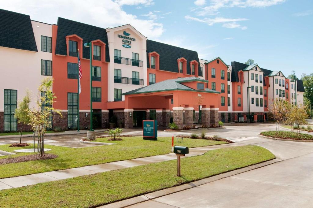 a rendering of a campus with buildings at Homewood Suites by Hilton Slidell in Slidell