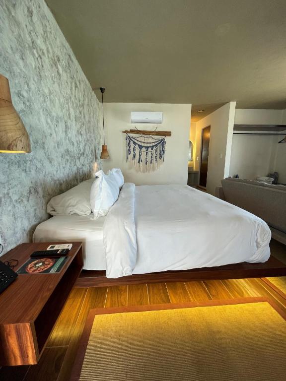 Postel nebo postele na pokoji v ubytování Hotel Scappata