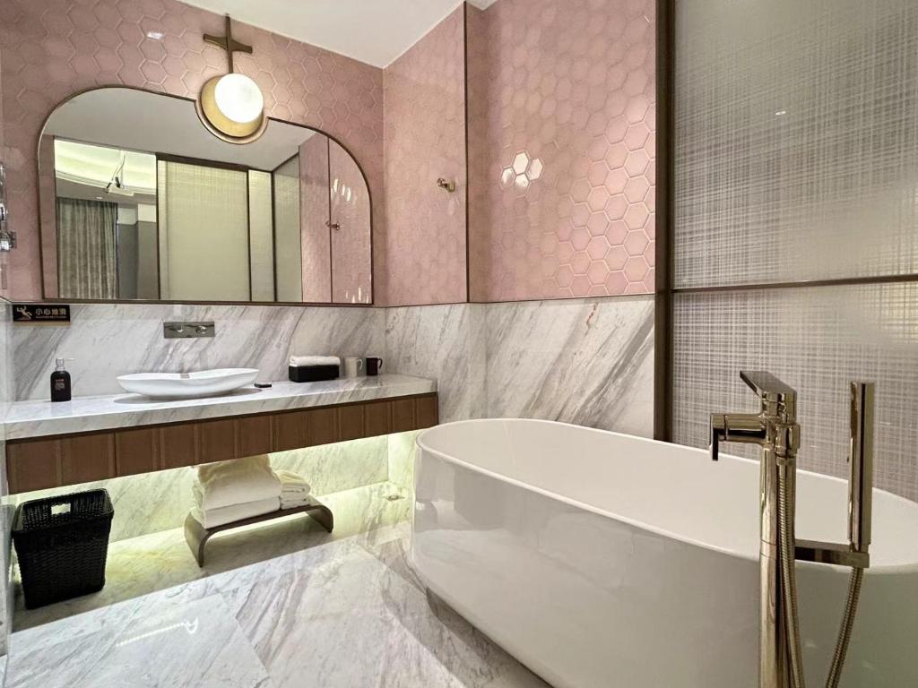 Koupelna v ubytování Qingdao Oriental Studio Chuangzhi SSAW Hotel