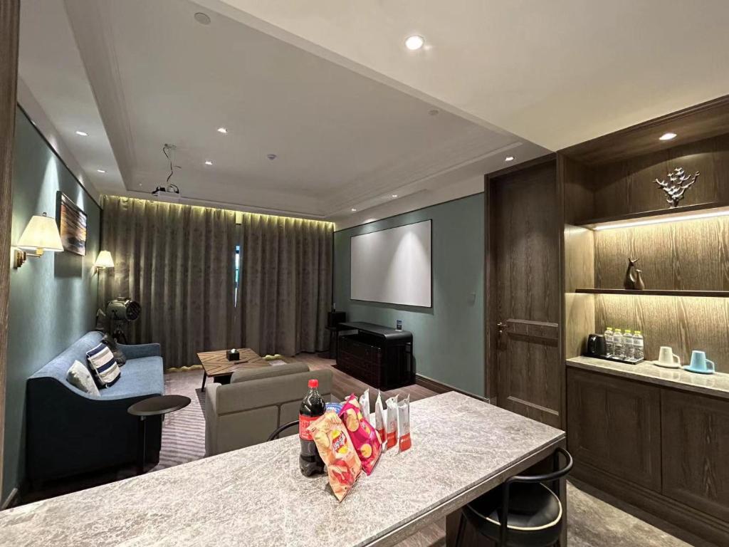 Nápoje v ubytování Qingdao Oriental Studio Chuangzhi SSAW Hotel