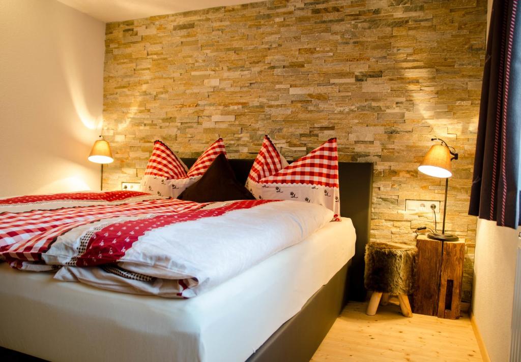 Postel nebo postele na pokoji v ubytování Ferienhaus Ötztal-Lodge
