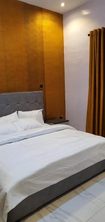 Postel nebo postele na pokoji v ubytování Sapphire Residences by Crystal