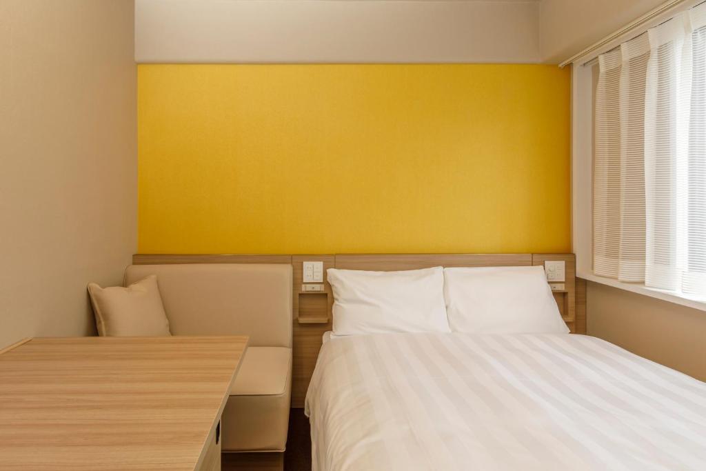 Postel nebo postele na pokoji v ubytování Via Inn Shimonoseki