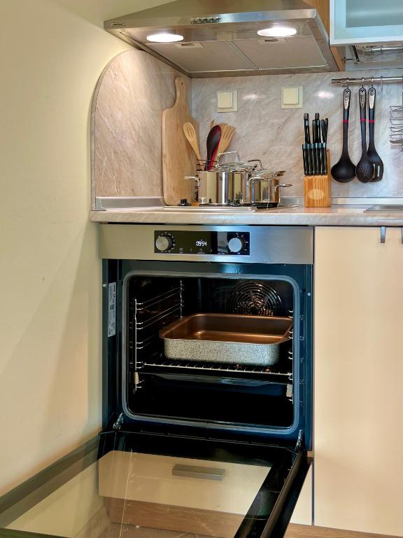 A kitchen or kitchenette at Premium Apartment Midia Beach