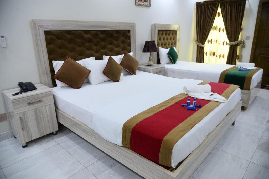 Hotel Deluxe Lahore - Deluxe Familienzimmer