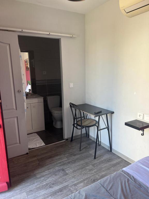 Postel nebo postele na pokoji v ubytování Hôtel des 2 Gares