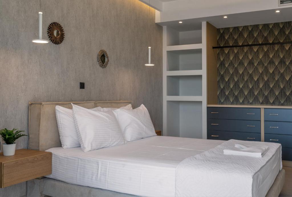 Ένα ή περισσότερα κρεβάτια σε δωμάτιο στο Cactus Villas