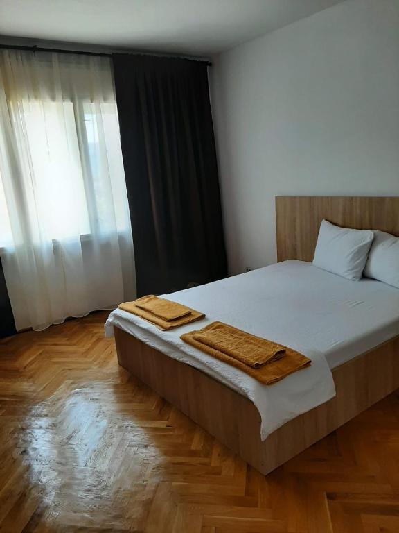 Postel nebo postele na pokoji v ubytování Casa RoxAmy