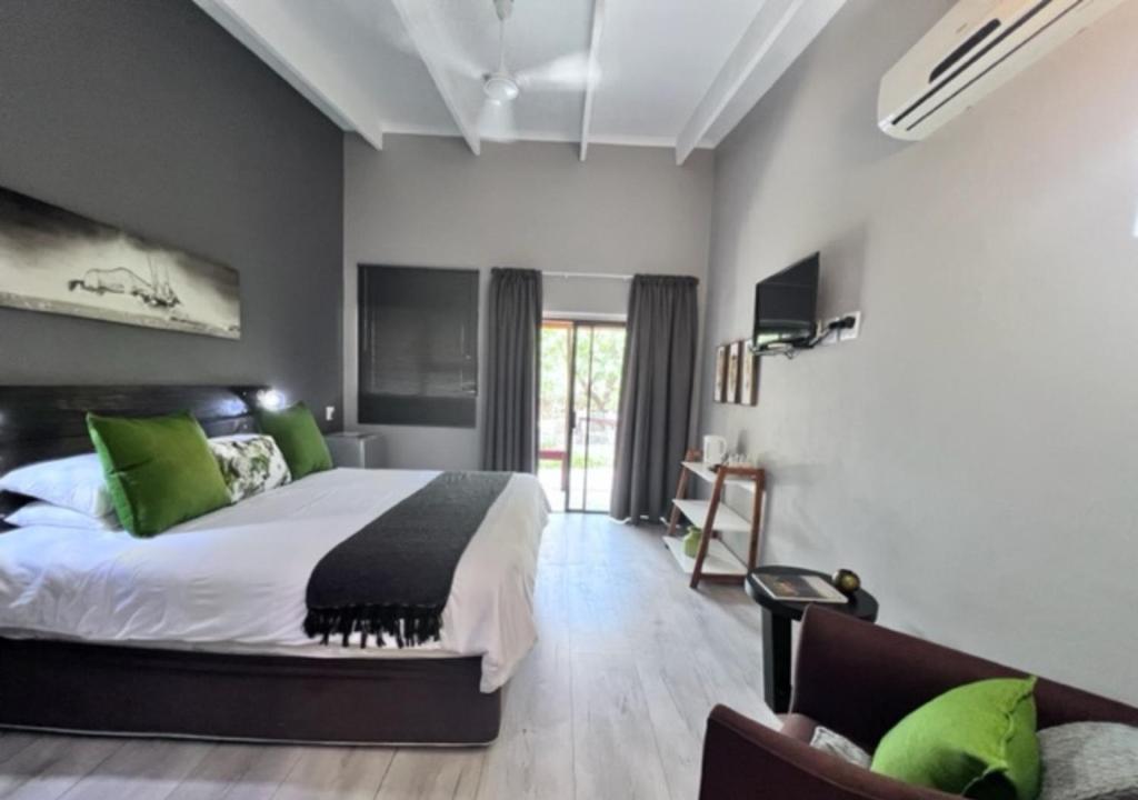 Letto o letti in una camera di Turaco Lodge - No Loadshedding