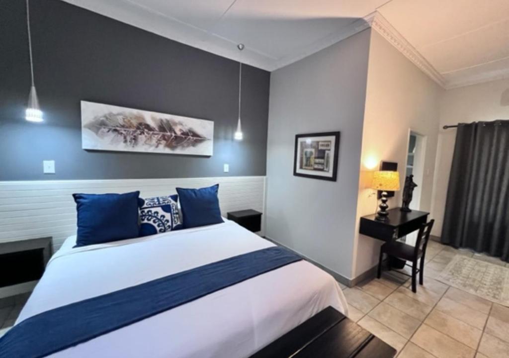 Letto o letti in una camera di Turaco Lodge - No Loadshedding