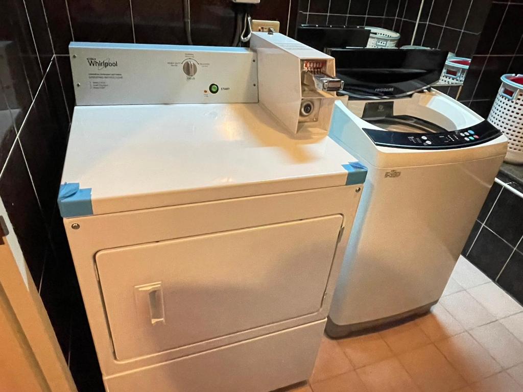 a sewing machine sitting on top of a counter at Wenpin Hotel - Pier 2 in Kaohsiung