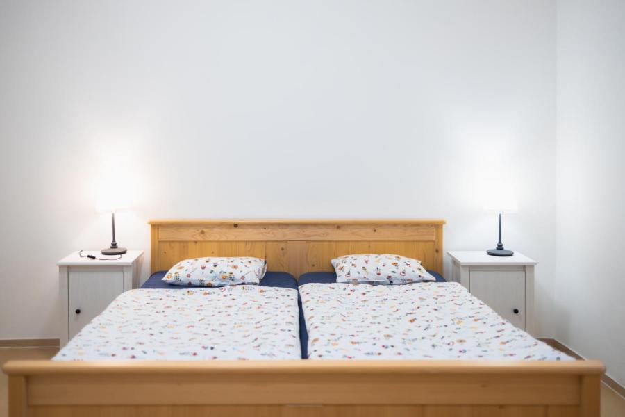 Postel nebo postele na pokoji v ubytování Hájenka Budislav