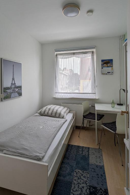 Postel nebo postele na pokoji v ubytování Ferienwohnung Bad Vilbel