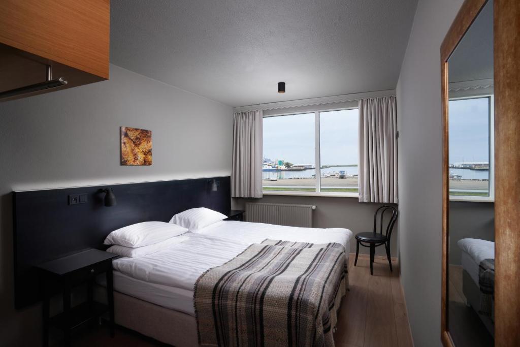 Postel nebo postele na pokoji v ubytování Höfn - Berjaya Iceland Hotels