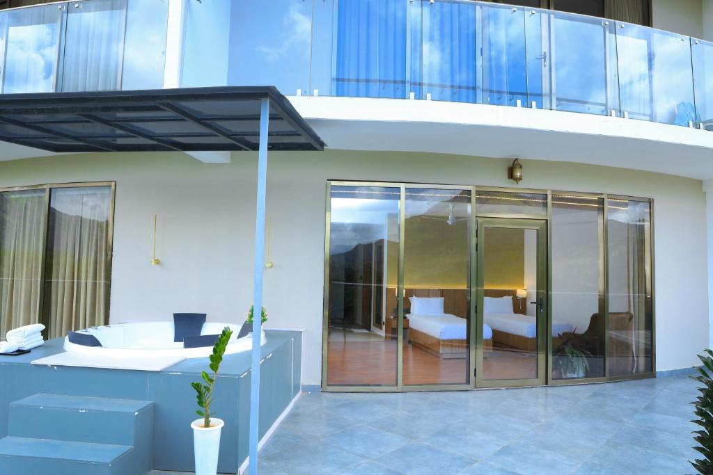 Balkón nebo terasa v ubytování Hotel Sky Sierra Wayanad