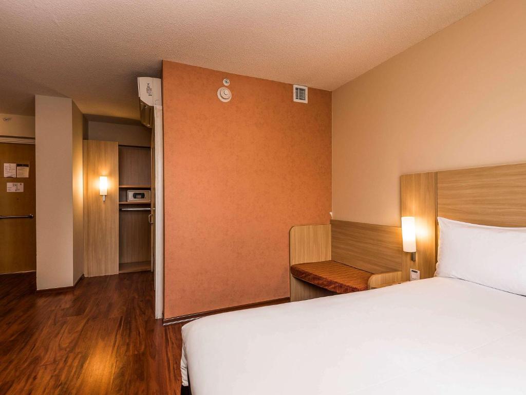 Postel nebo postele na pokoji v ubytování ibis Lima Larco Miraflores