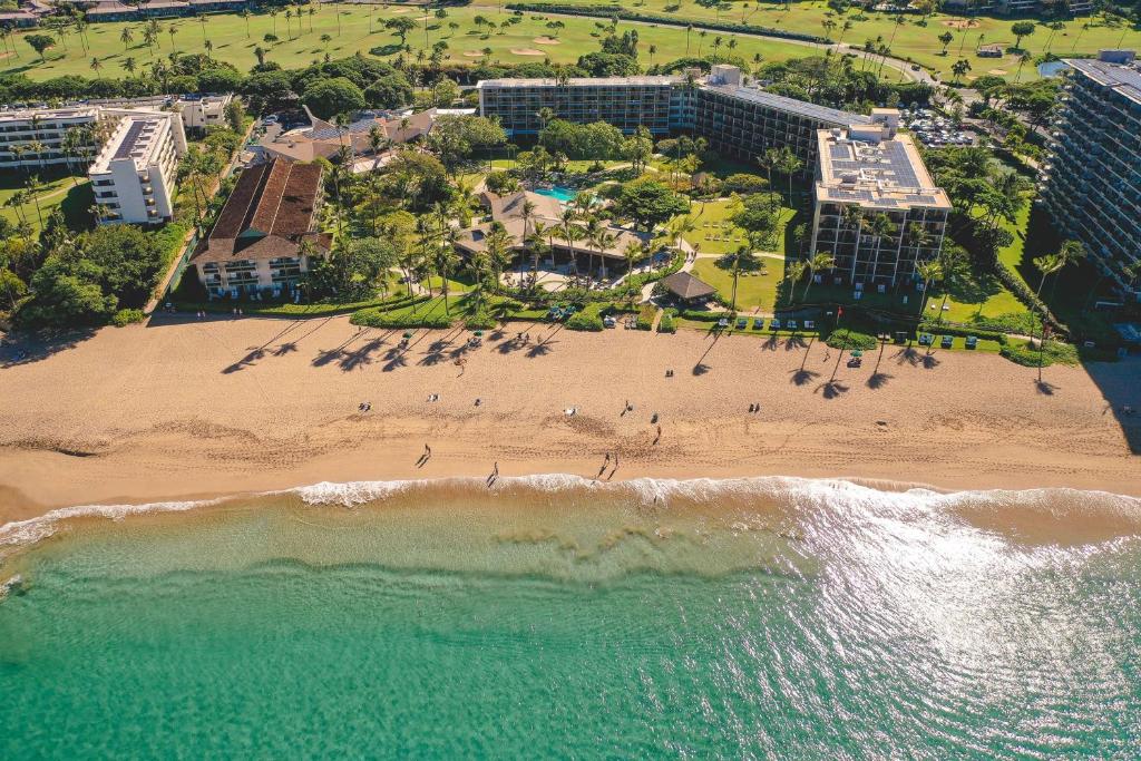 an aerial view of a beach and the ocean at OUTRIGGER Kāʻanapali Beach Resort in Lahaina