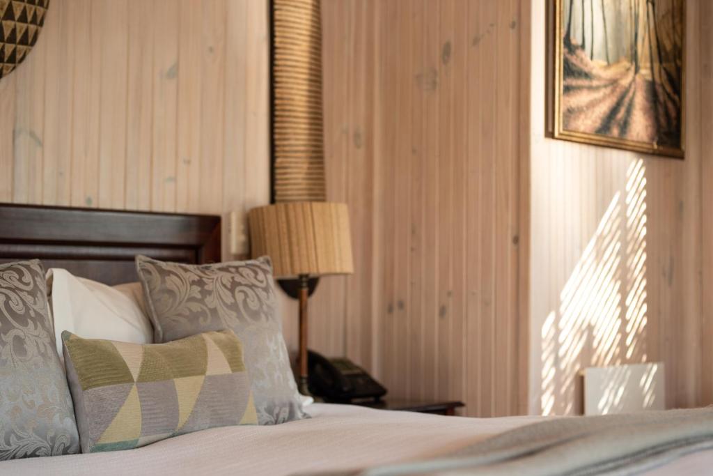 Postel nebo postele na pokoji v ubytování Prana Lodge