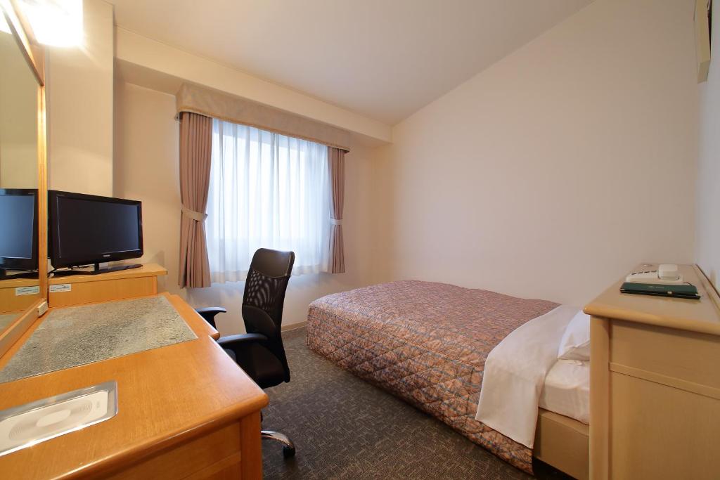 TV a/nebo společenská místnost v ubytování Hotel Bientos