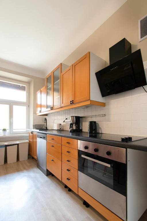 Kuchyňa alebo kuchynka v ubytovaní Prestige location apartments Pijarska street