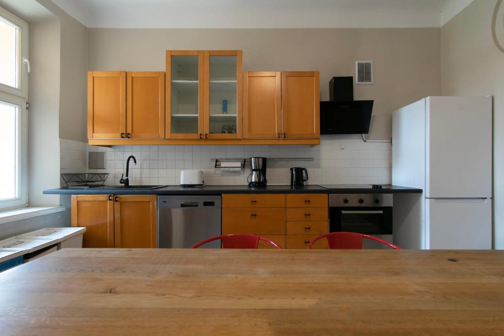Kuchyňa alebo kuchynka v ubytovaní Prestige location apartments Pijarska street