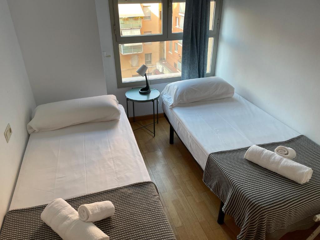 Postel nebo postele na pokoji v ubytování NEW! Amazing 2 bedroom apartment in Rambla del Poblenou