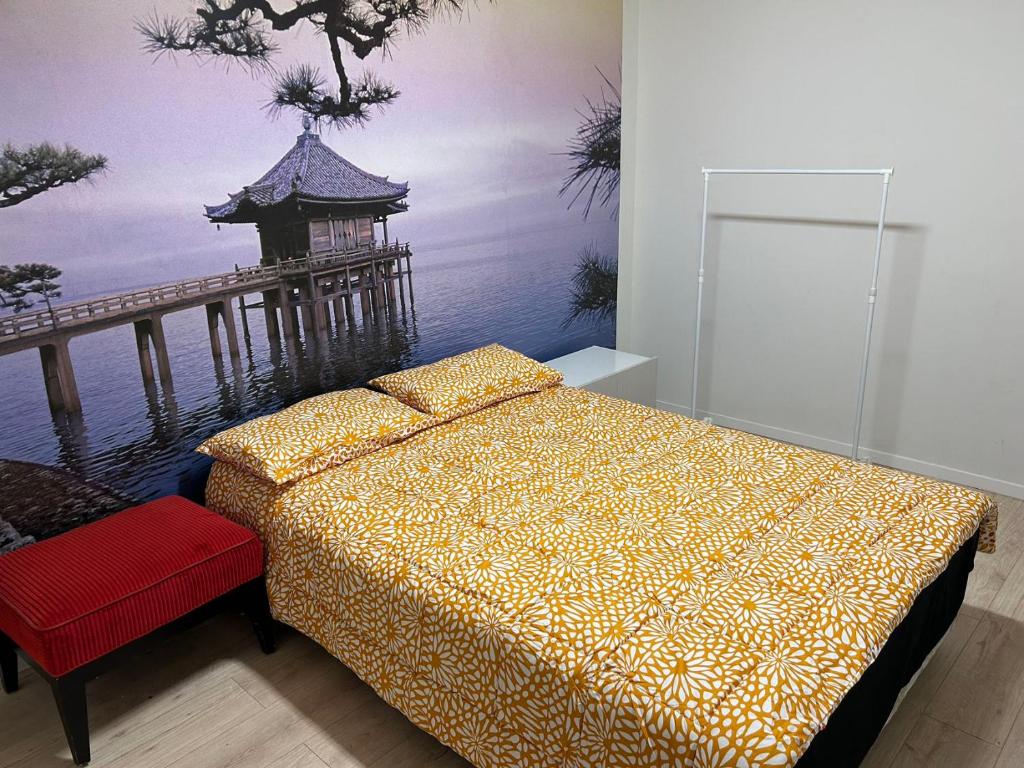 Postel nebo postele na pokoji v ubytování Sky World Cozy Home