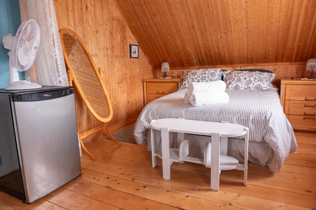 Postel nebo postele na pokoji v ubytování Bed & café Petit Papillon