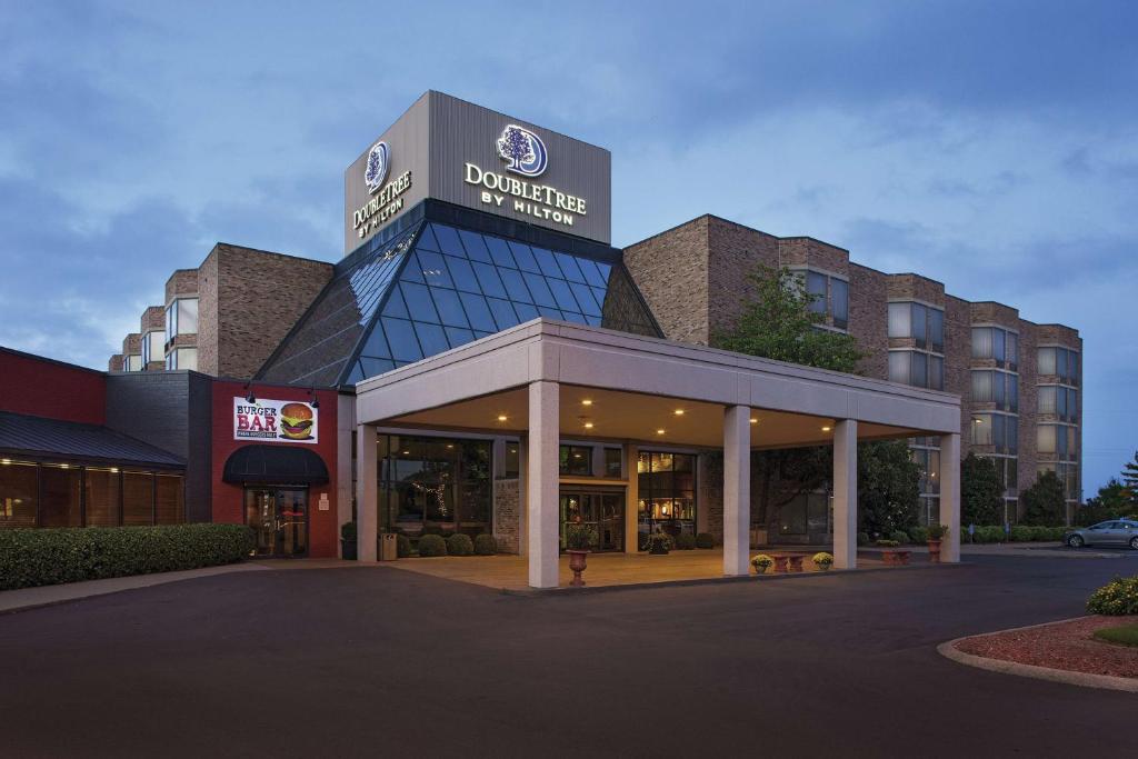 a building with a sign on top of it at DoubleTree by Hilton Murfreesboro in Murfreesboro