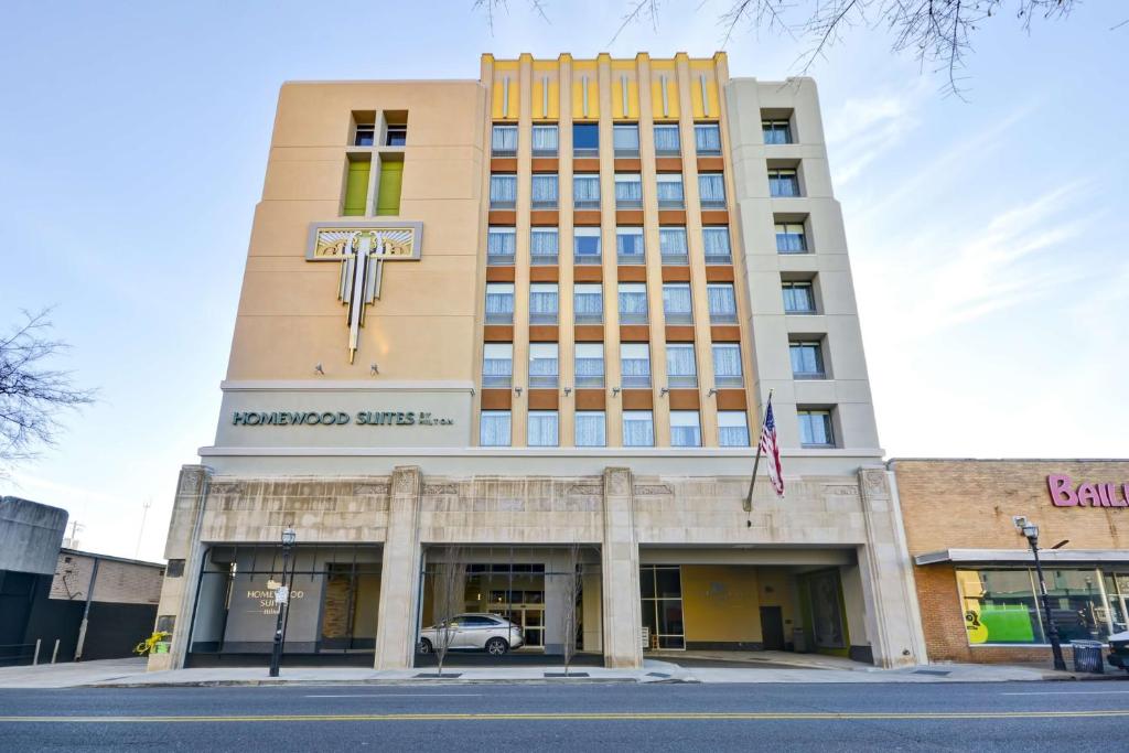 a building with a clock on the front of it at Homewood Suites by Hilton Birmingham Downtown Near UAB in Birmingham