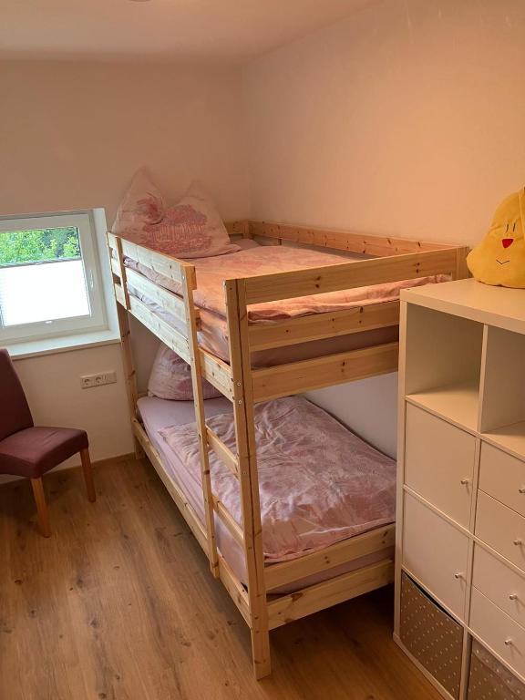 Postel nebo postele na pokoji v ubytování Mahdgut