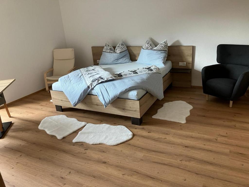 Postel nebo postele na pokoji v ubytování Mahdgut