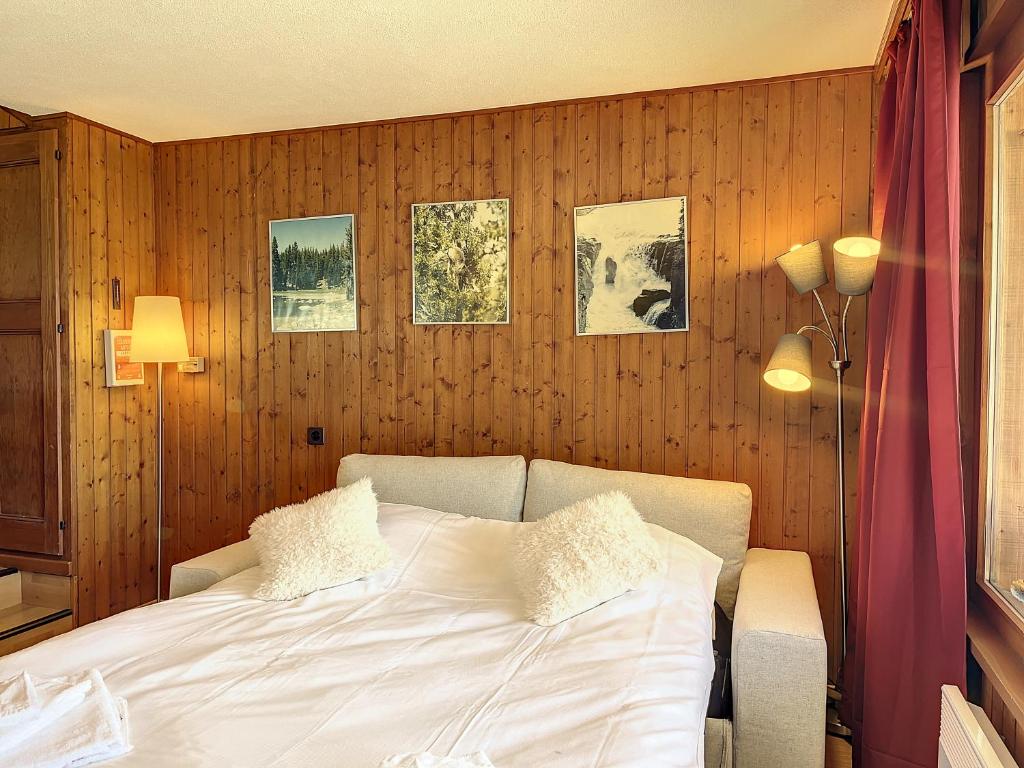 Postel nebo postele na pokoji v ubytování Residence Emeraude