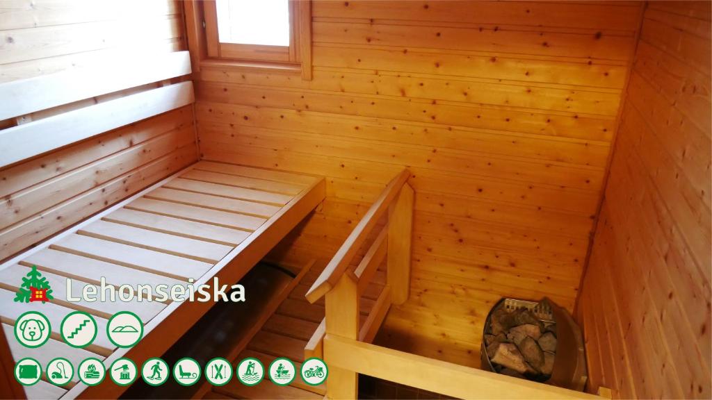 Postel nebo postele na pokoji v ubytování Talo Ylläs
