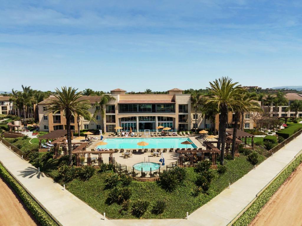 an aerial view of a resort with a swimming pool at The Cassara Carlsbad, Tapestry Collection By Hilton in Carlsbad