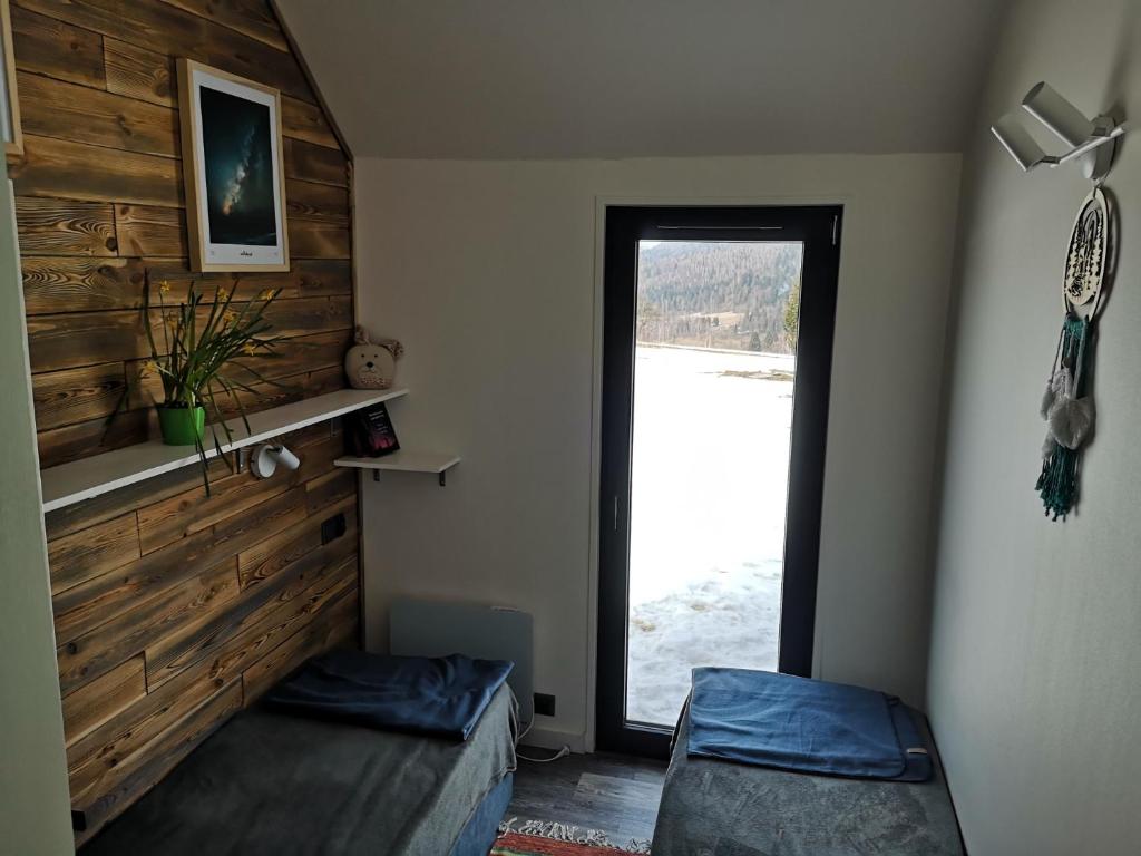 Postel nebo postele na pokoji v ubytování Pod Gwiazdami