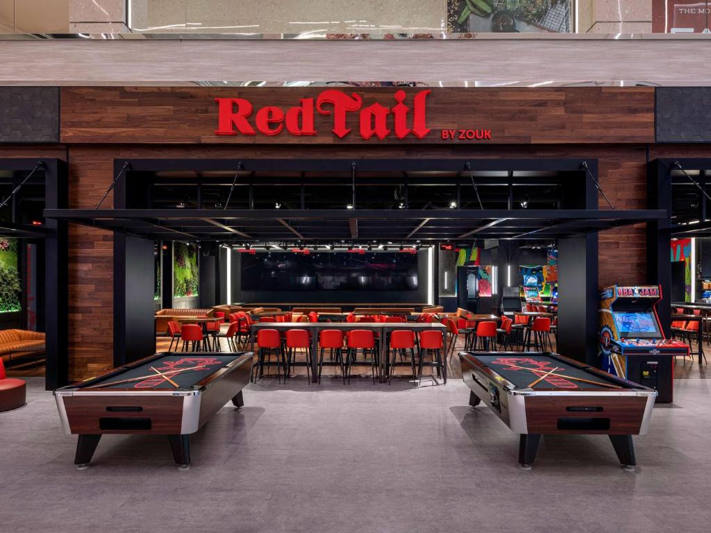 Ein Restaurant oder anderes Speiselokal in der Unterkunft Crockfords Las Vegas, LXR Hotels &amp; Resorts at Resorts World 