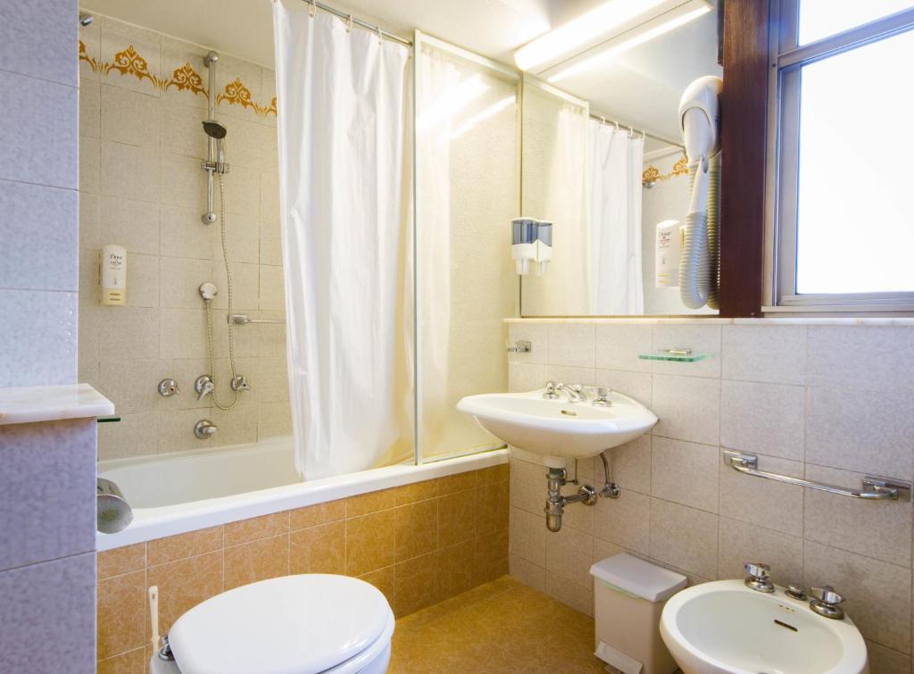 Koupelna v ubytování Hotel Reale