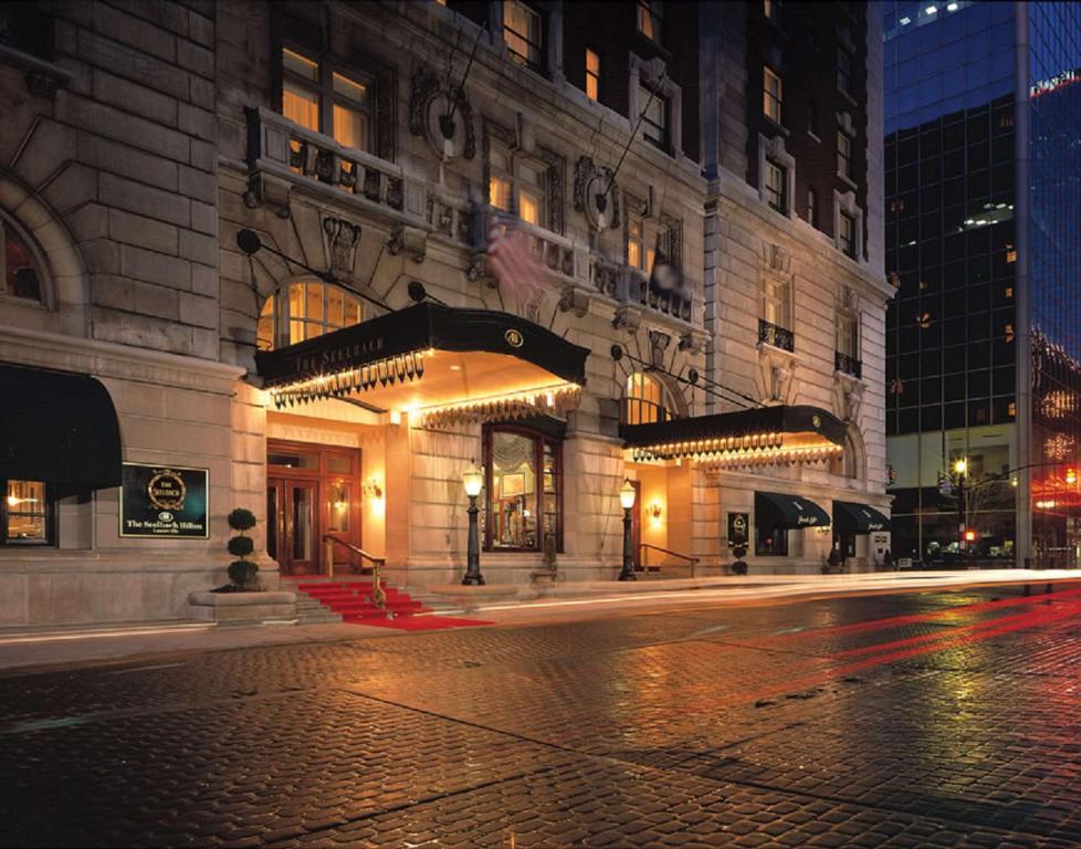 a building on a city street at night at The Seelbach Hilton Louisville in Louisville